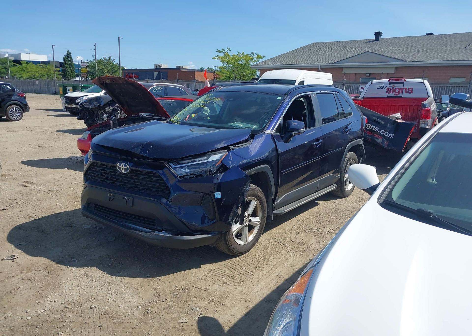 2023 TOYOTA RAV4 HYBRID XLE
