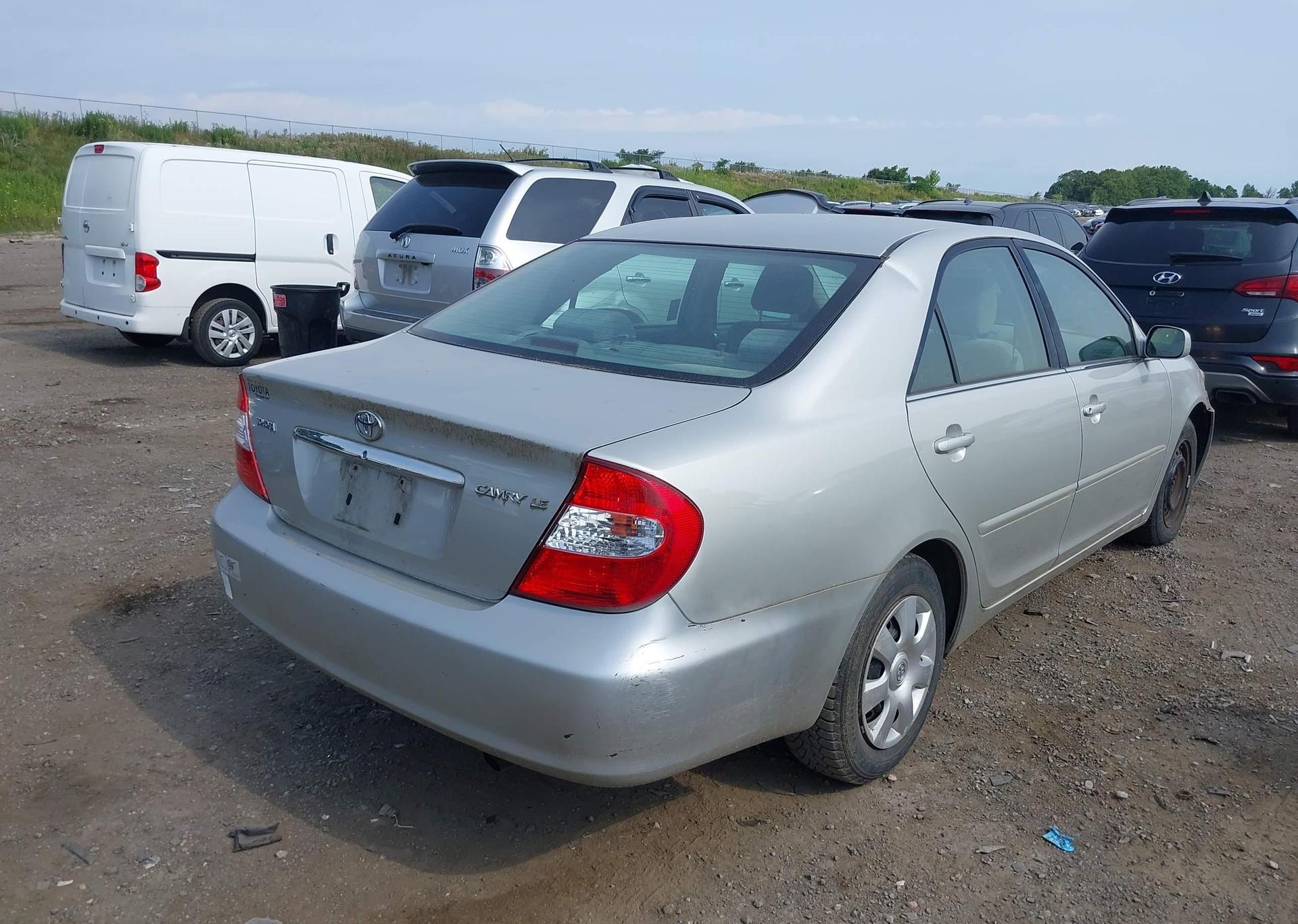 2004 TOYOTA CAMRY LE