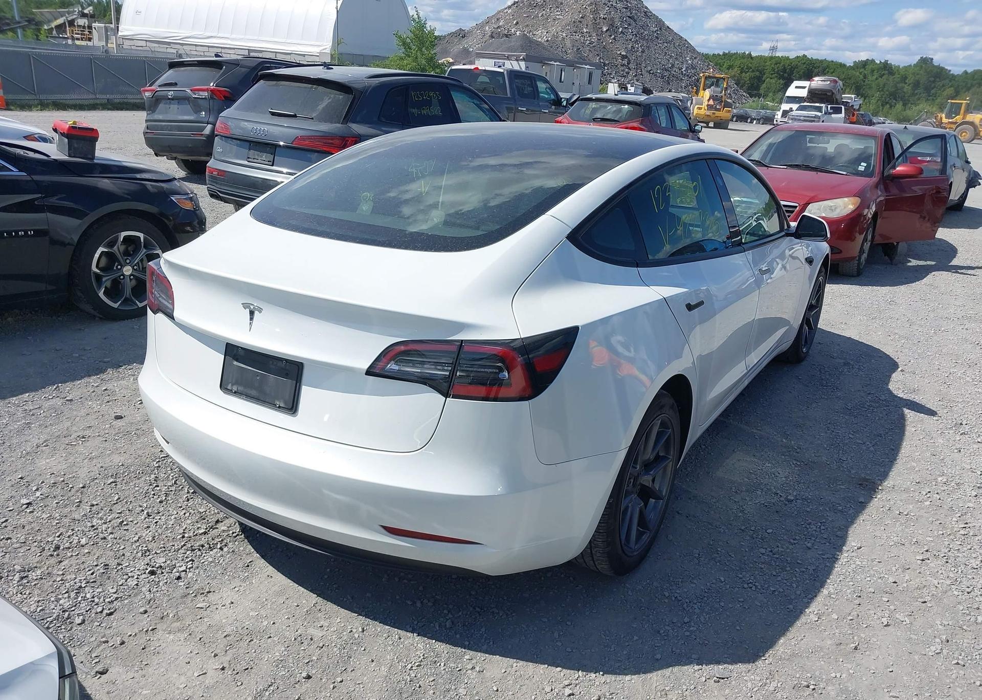 2023 TESLA MODEL 3 RWD