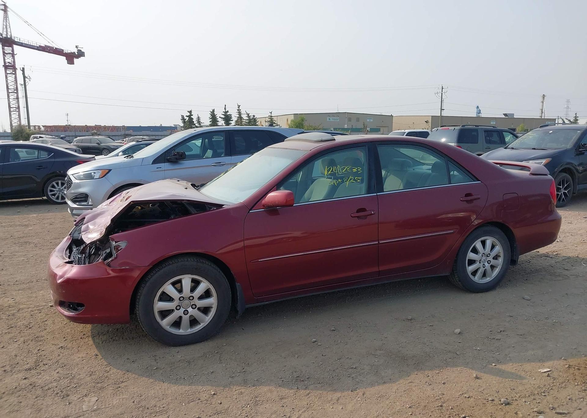 2004 TOYOTA CAMRY LE