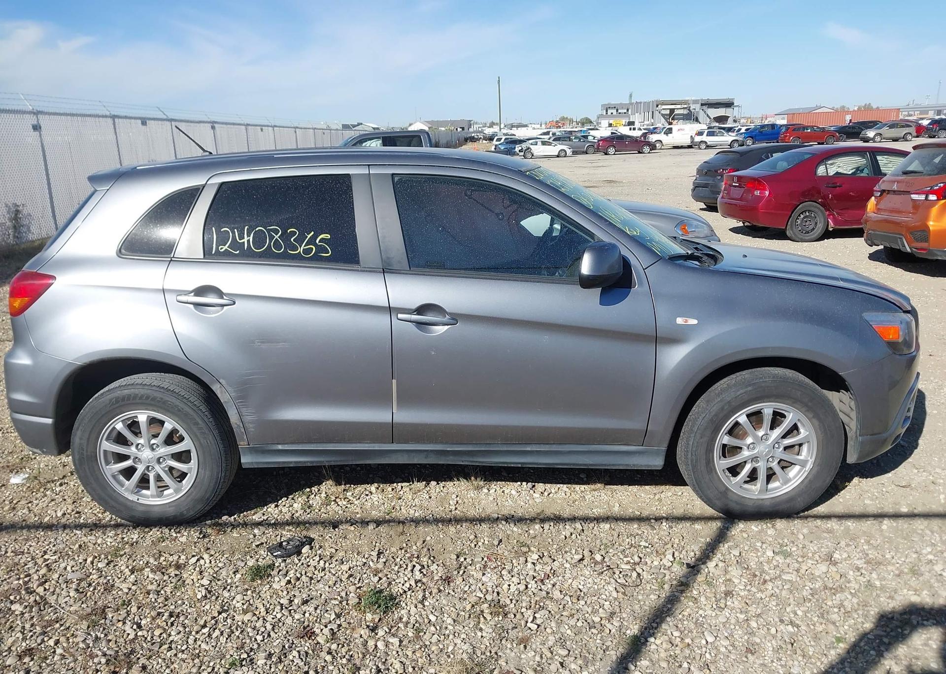 2011 MITSUBISHI RVR SE