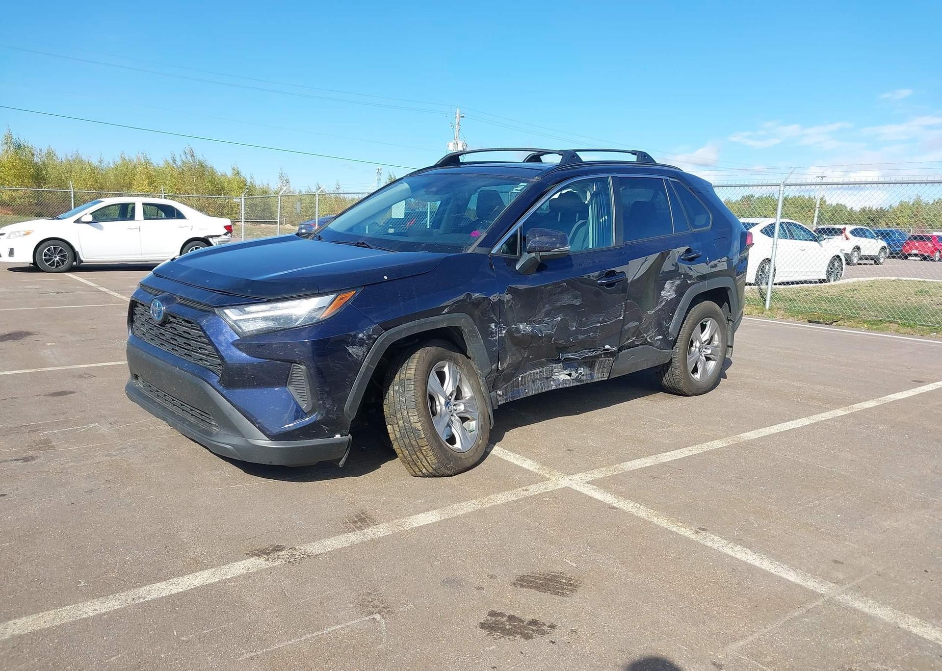 2023 TOYOTA RAV4 HYBRID XLE