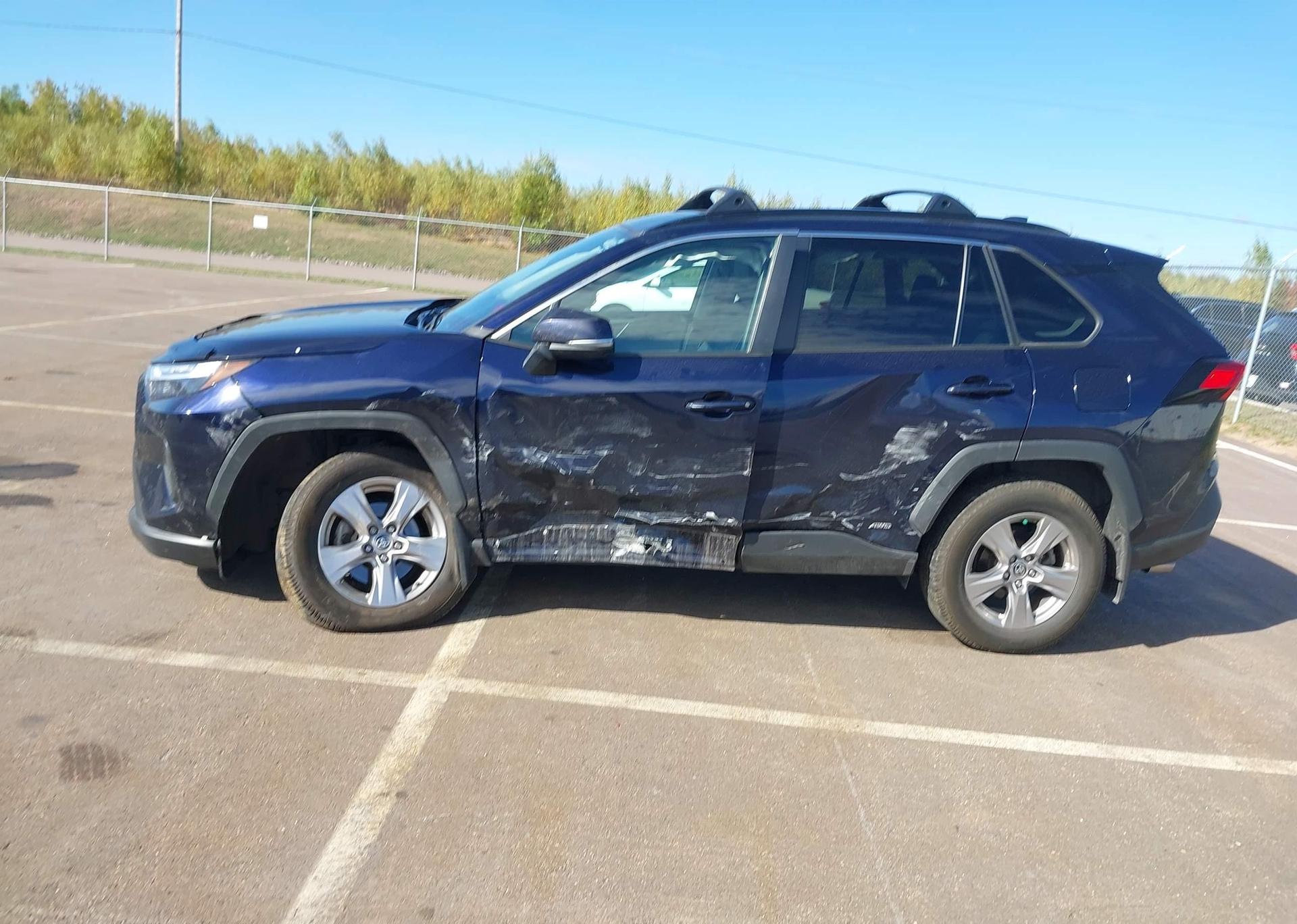 2023 TOYOTA RAV4 HYBRID XLE