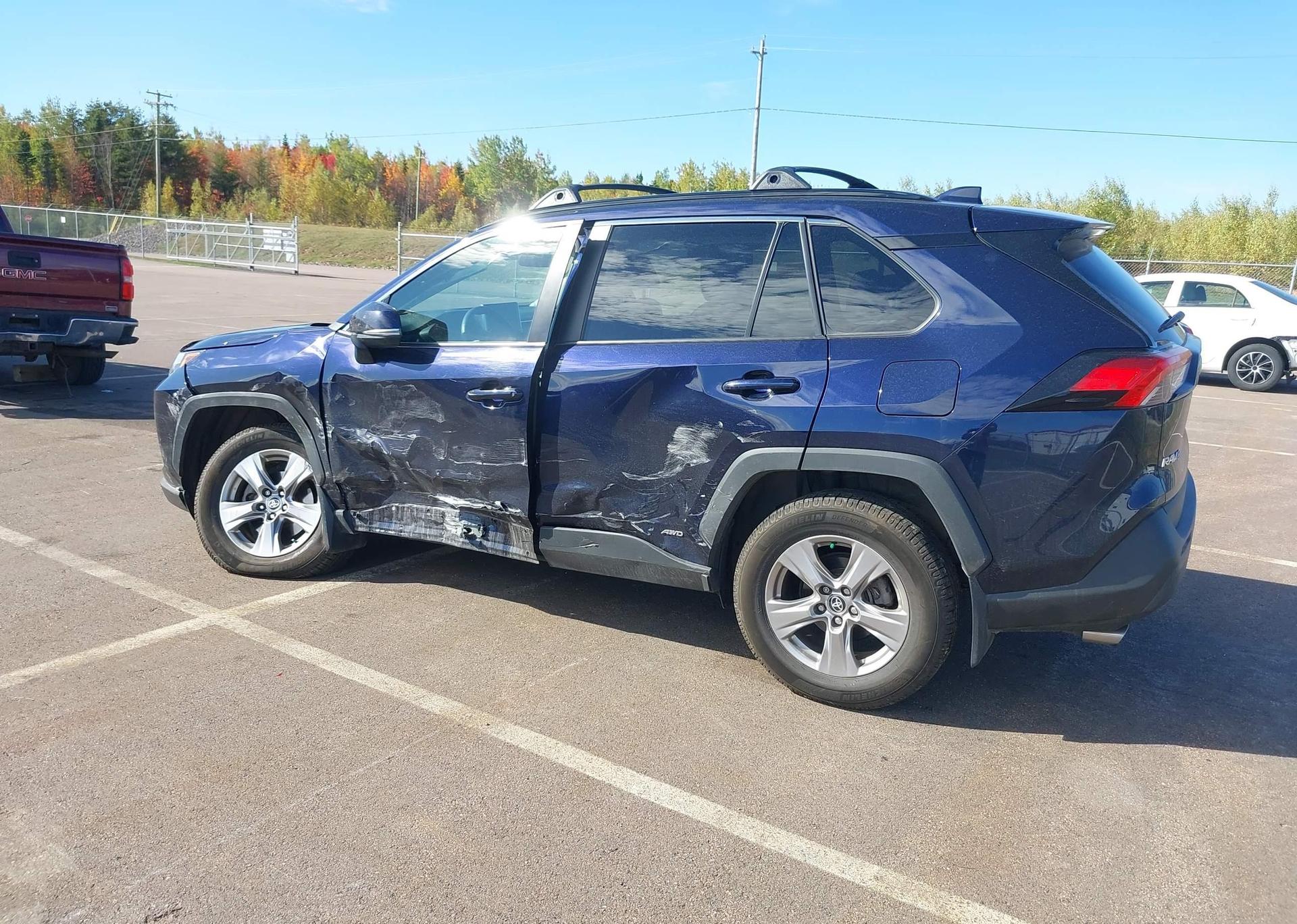 2023 TOYOTA RAV4 HYBRID XLE