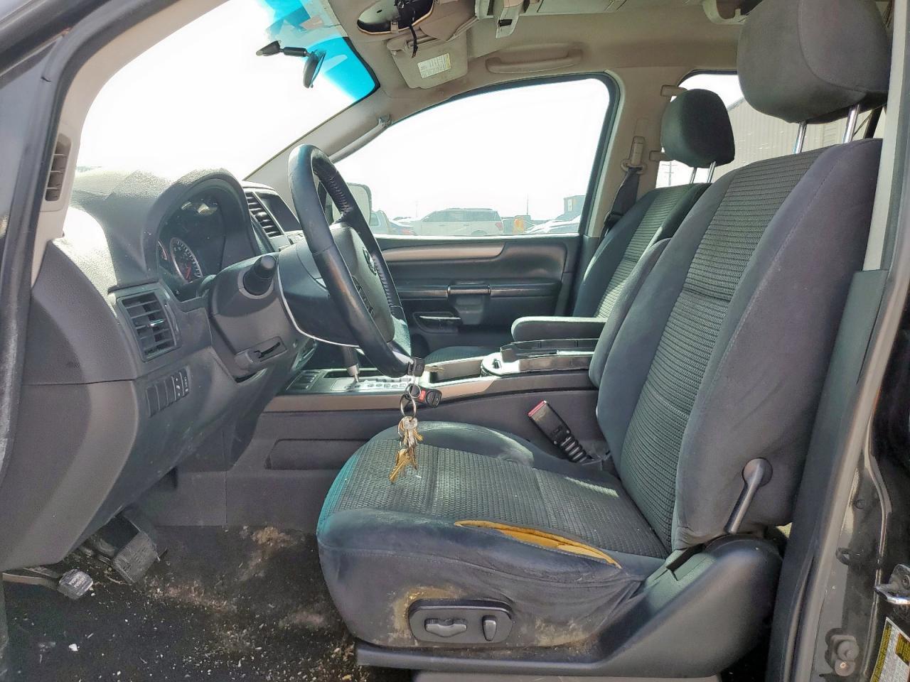 2009 NISSAN 210