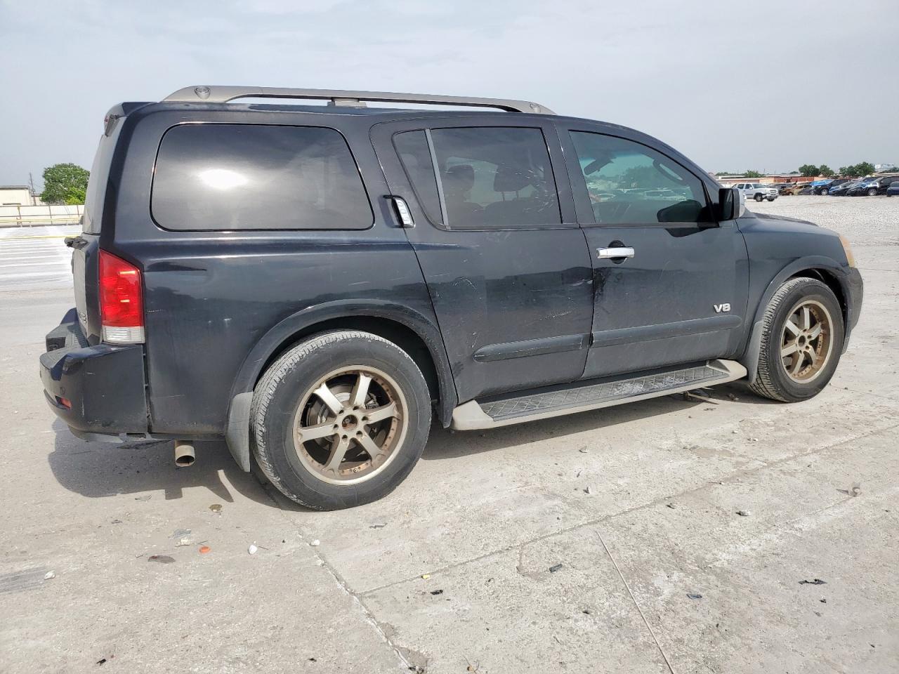 2009 NISSAN 210
