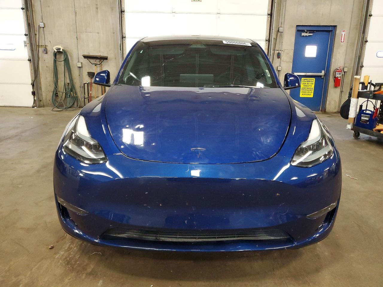 2025 TESLA MODEL Y