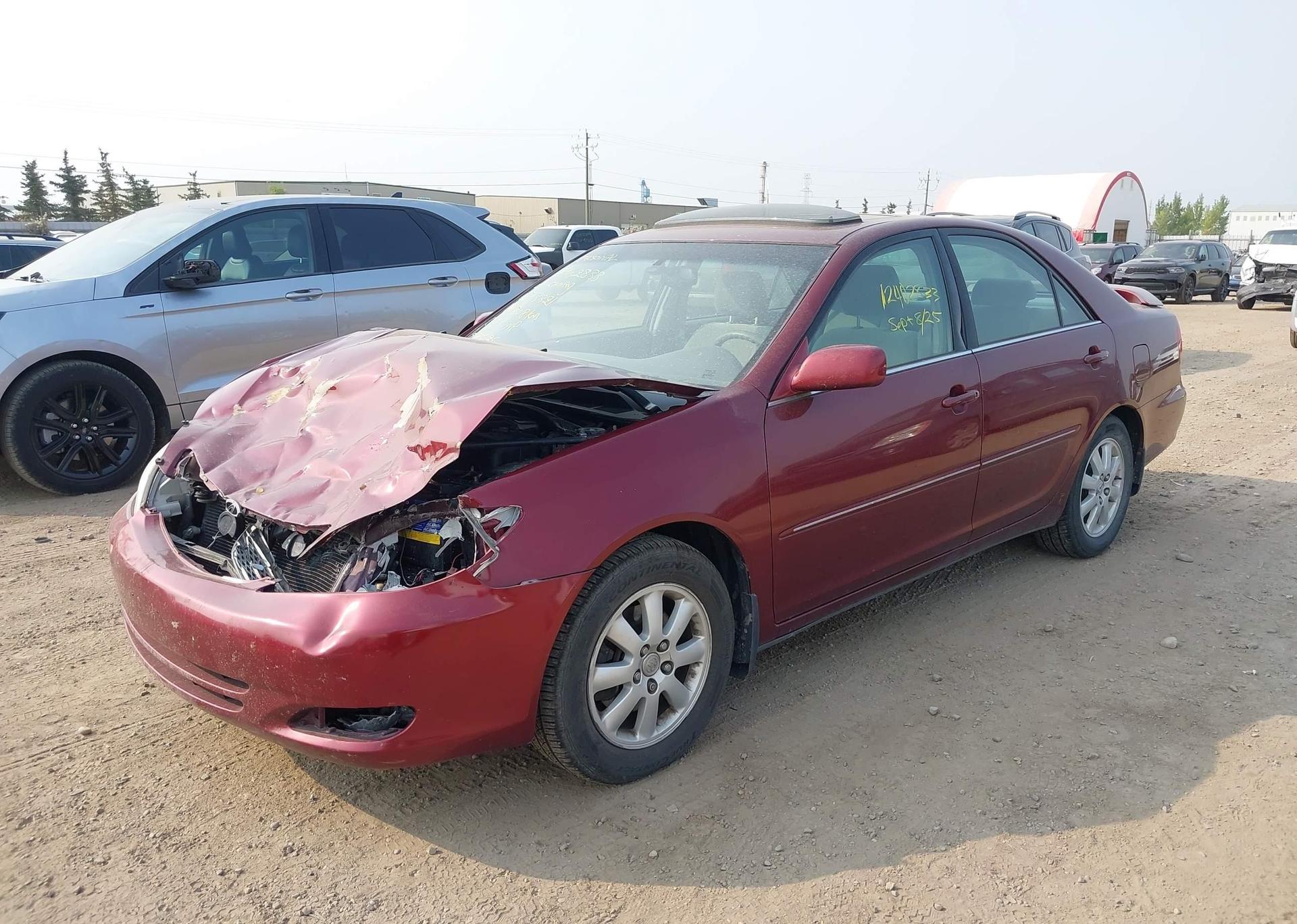 2004 TOYOTA CAMRY LE